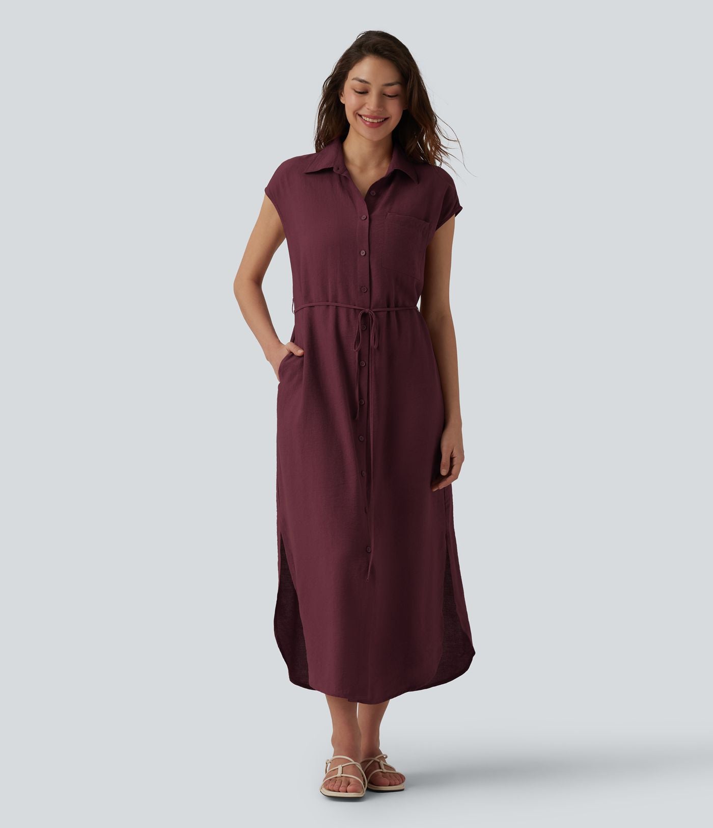 Robe chemise casual mi-longue col manches courtes ceinturée ourlet arrondi avec fente et poches