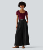Pantalon tailleur 7/8 large plissé taille haute aspect lin avec poches