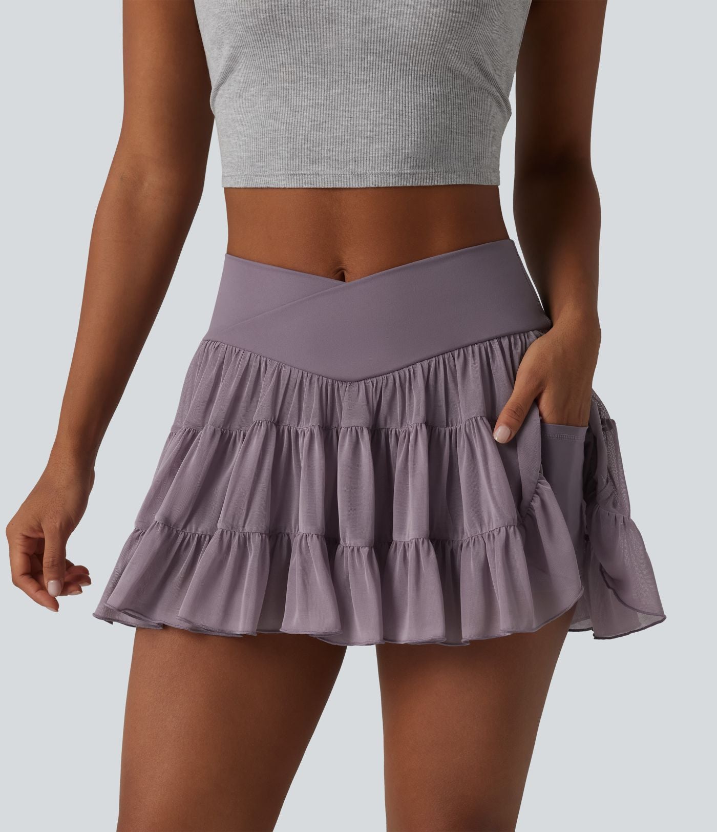 Jupe de tennis courte 2 en 1 fluide à taille haute et croisée avec poches - Longueur courte