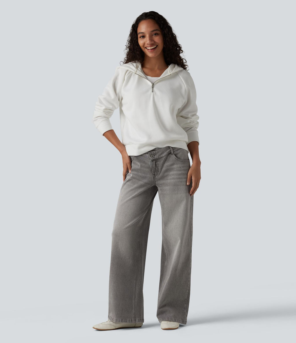 Halara Flex™ Jean large asymétrique taille basse avec bouton, fermeture éclair et poches multiples, délavé et extensible en maille