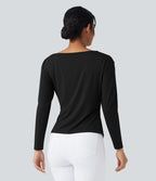 Blouse de travail ajustée col bateau manches longues froncée à ourlet asymétrique
