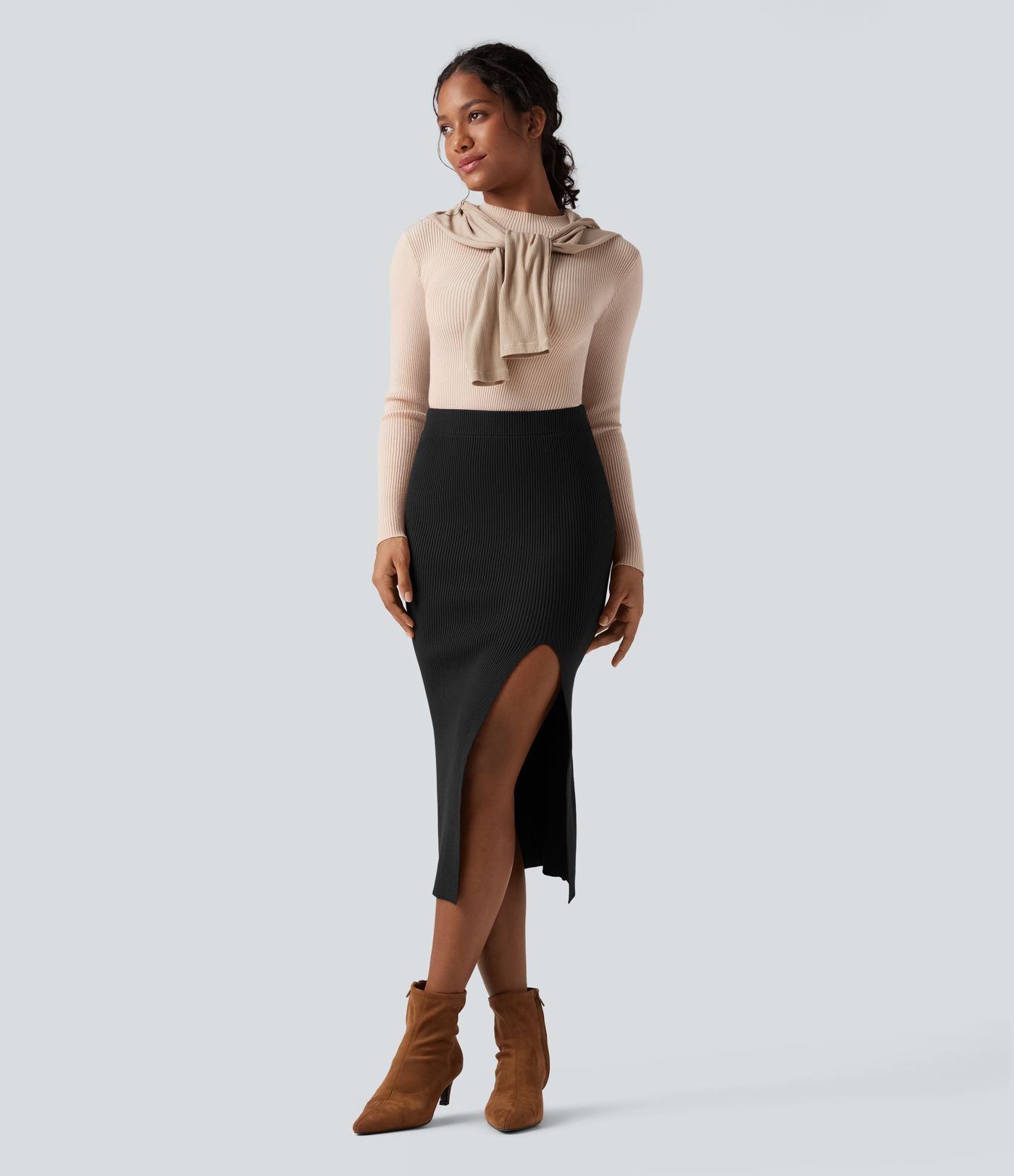Jupe pull mi-longue moulante fendue taille haute