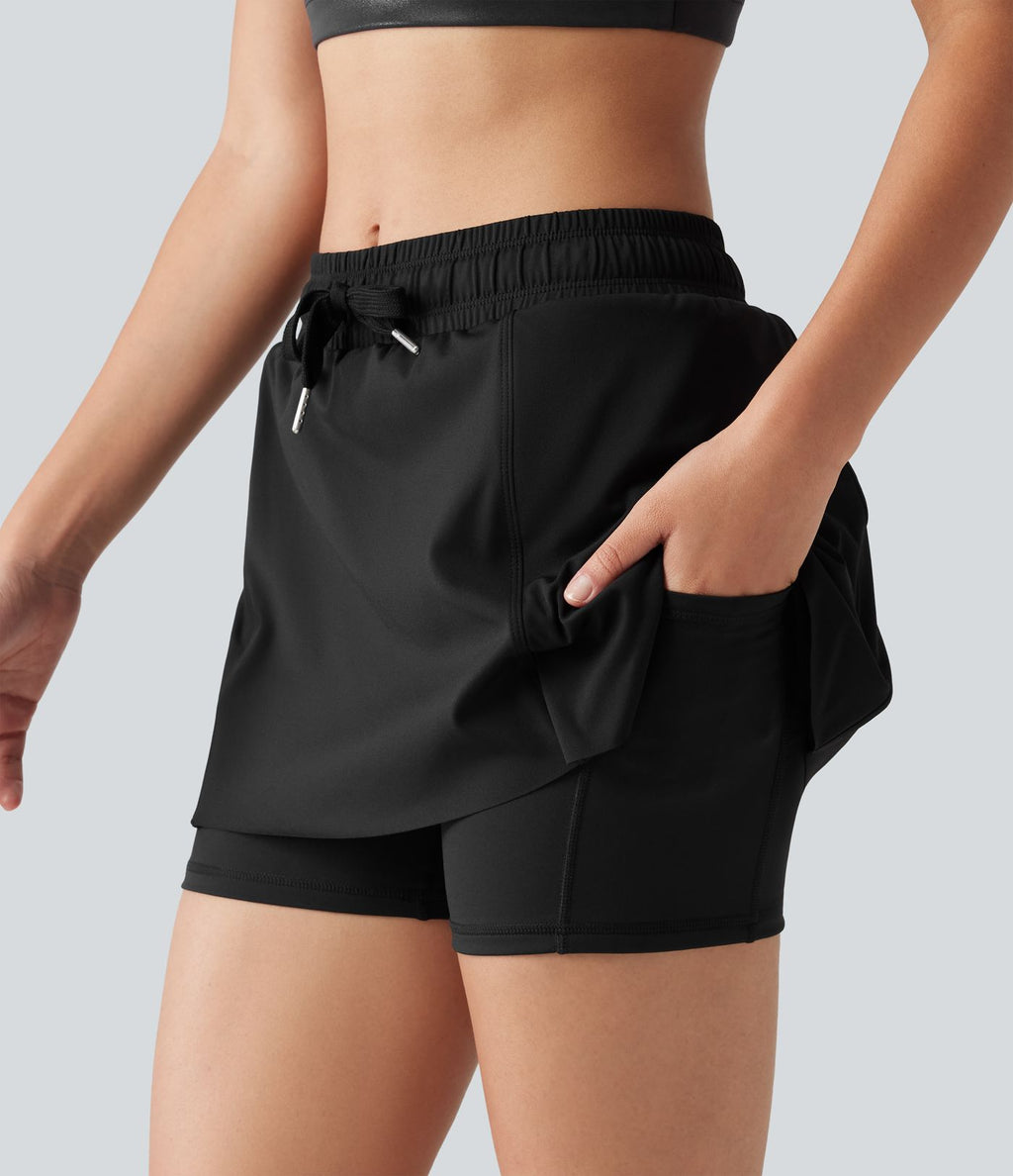 Jupe-short de sport mini SoftlyZero™ Airy taille mi-haute à ourlet croisé, toucher frais, cordon ajustable et poches