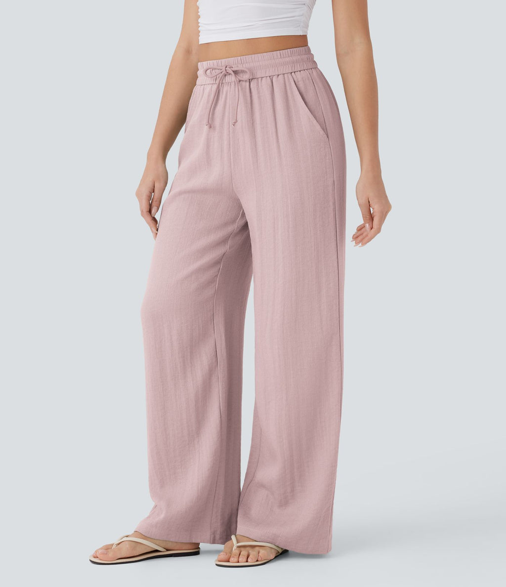 Pantalon large fluide taille haute avec cordon de serrage, poches latérales et aspect lin