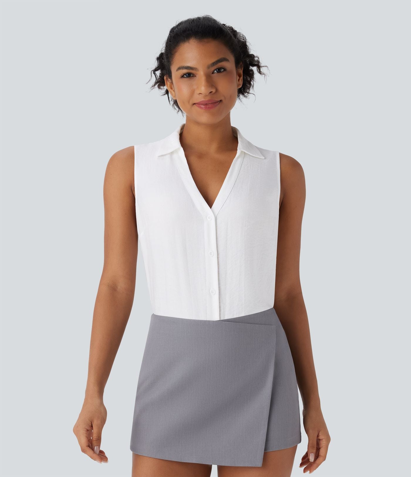Chemise de travail sans manches à col V et boutons