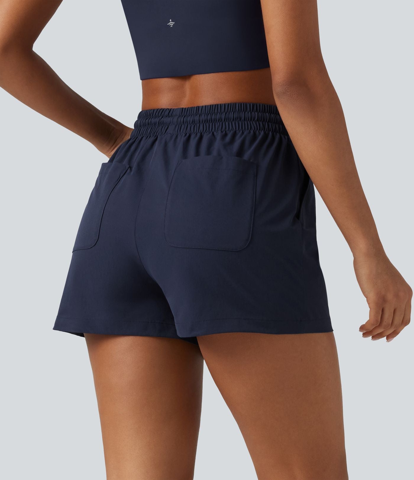 Short de sport baggy taille haute extensible en popeline avec cordon de serrage et poches