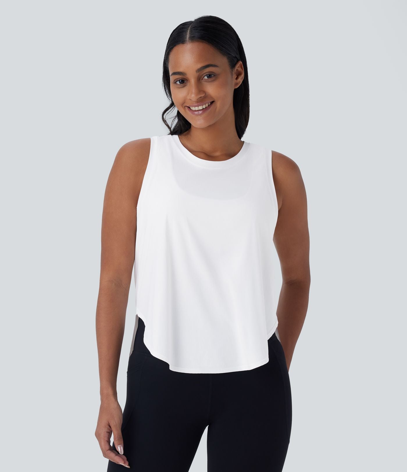 Haut de sport yoga col rond sans manches ourlet arrondi
