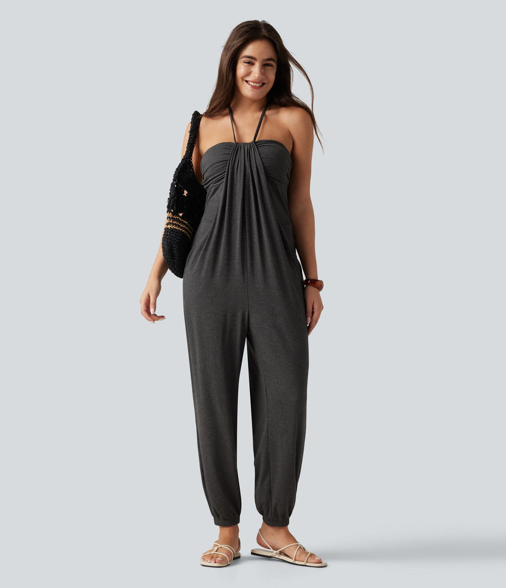 Combinaison-pantalon fuselée de style resort avec soutien-gorge intégré et dos nu à nouer, dotée de poches