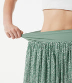 Jupe de sport mini 2-en-1 fluide taille mi-haute en mesh léopard avec poche