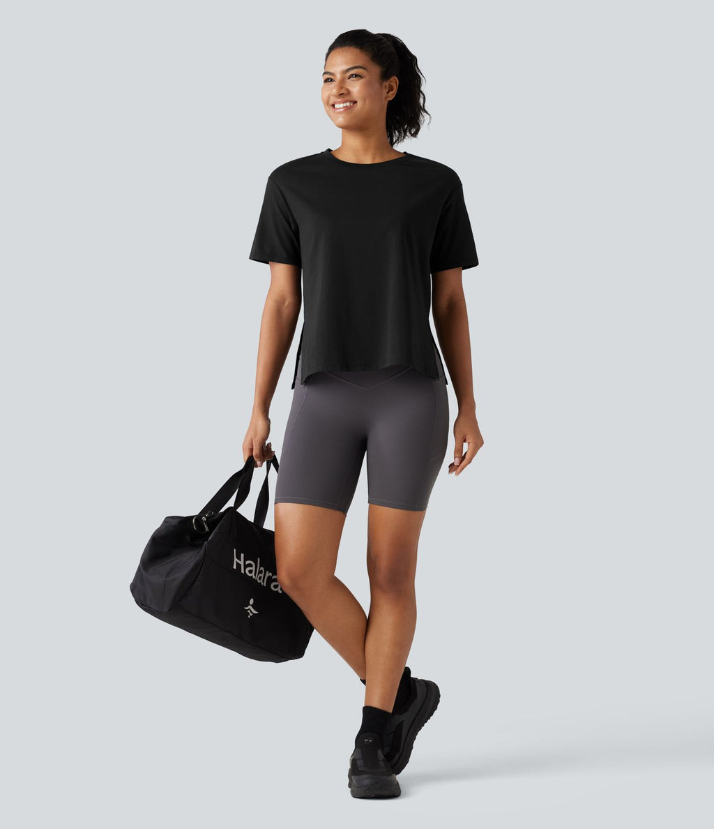 Haut de sport en coton col rond à manches courtes, ourlet fendu et coupe ample pour le yoga