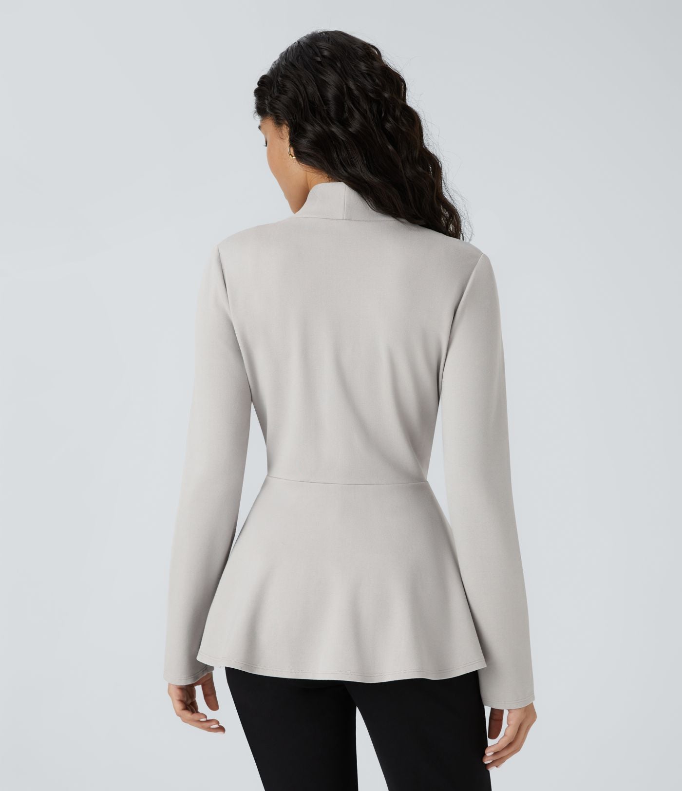 Veste péplum de travail col en V avec un bouton