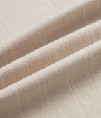 Pantalon tailleur asymétrique effet lin, taille moyenne, coupe ballon, à poches