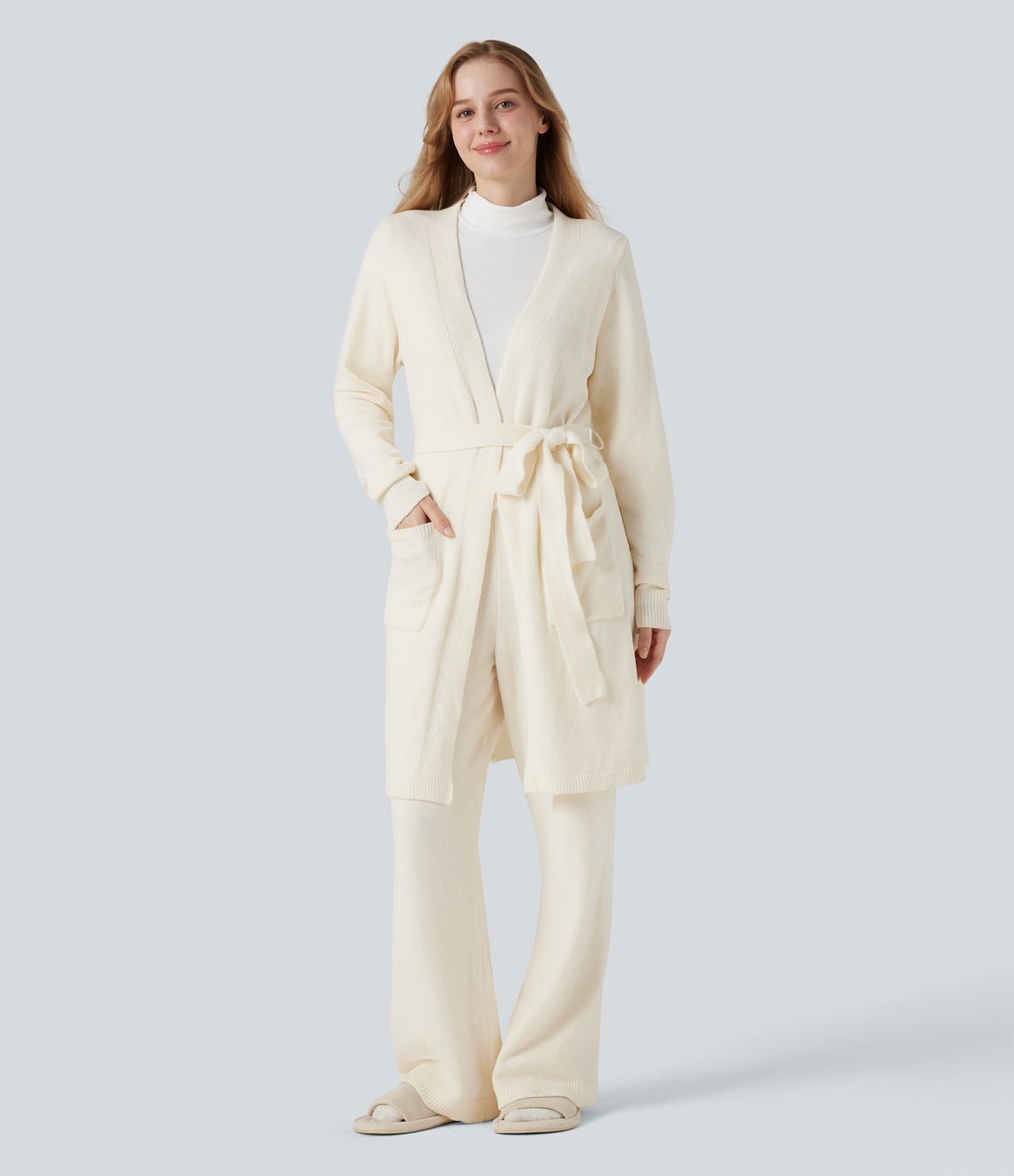 Robe d'intérieur longue tricot ouverte ceinturée manches longues avec poches