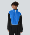 Sweat bicolore en polaire col montant avec demi-zip et manches longues