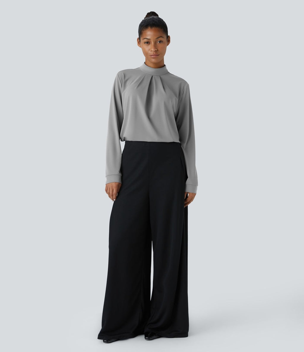 Blouse de travail à col montant, plis, boutons au dos et manches longues