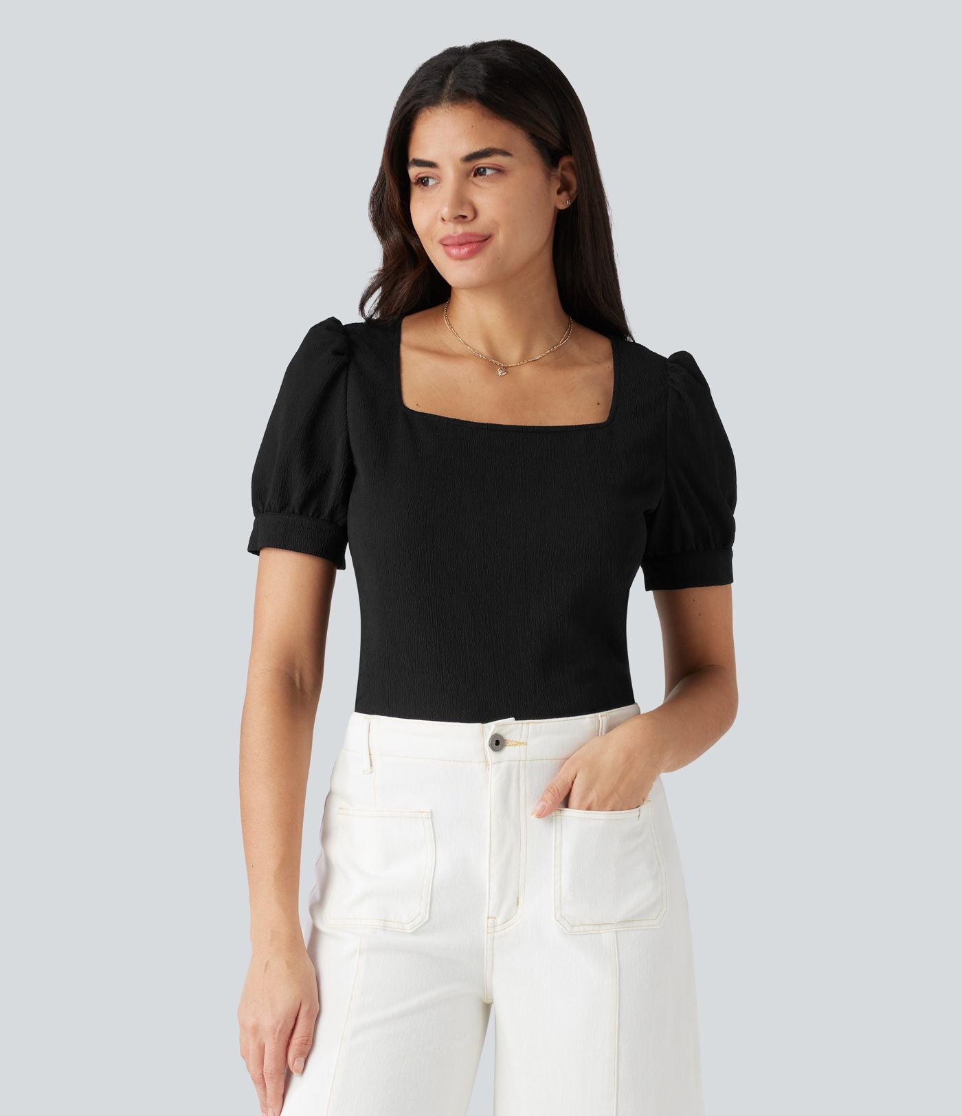 Blouse habillée col carré à manches bouffantes et tissu texturé