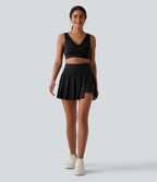 Breezeful™ Jupe mini sport 2 en 1 plissée taille haute mesh contrasté séchage rapide avec poches
