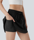 Mini-jupe de tennis 2-en-1 taille moyenne avec cordon de serrage, filet contrasté et poches latérales